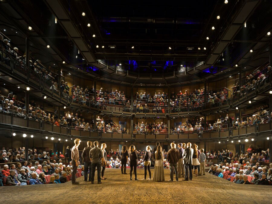 RSC image of actors on stage with audience