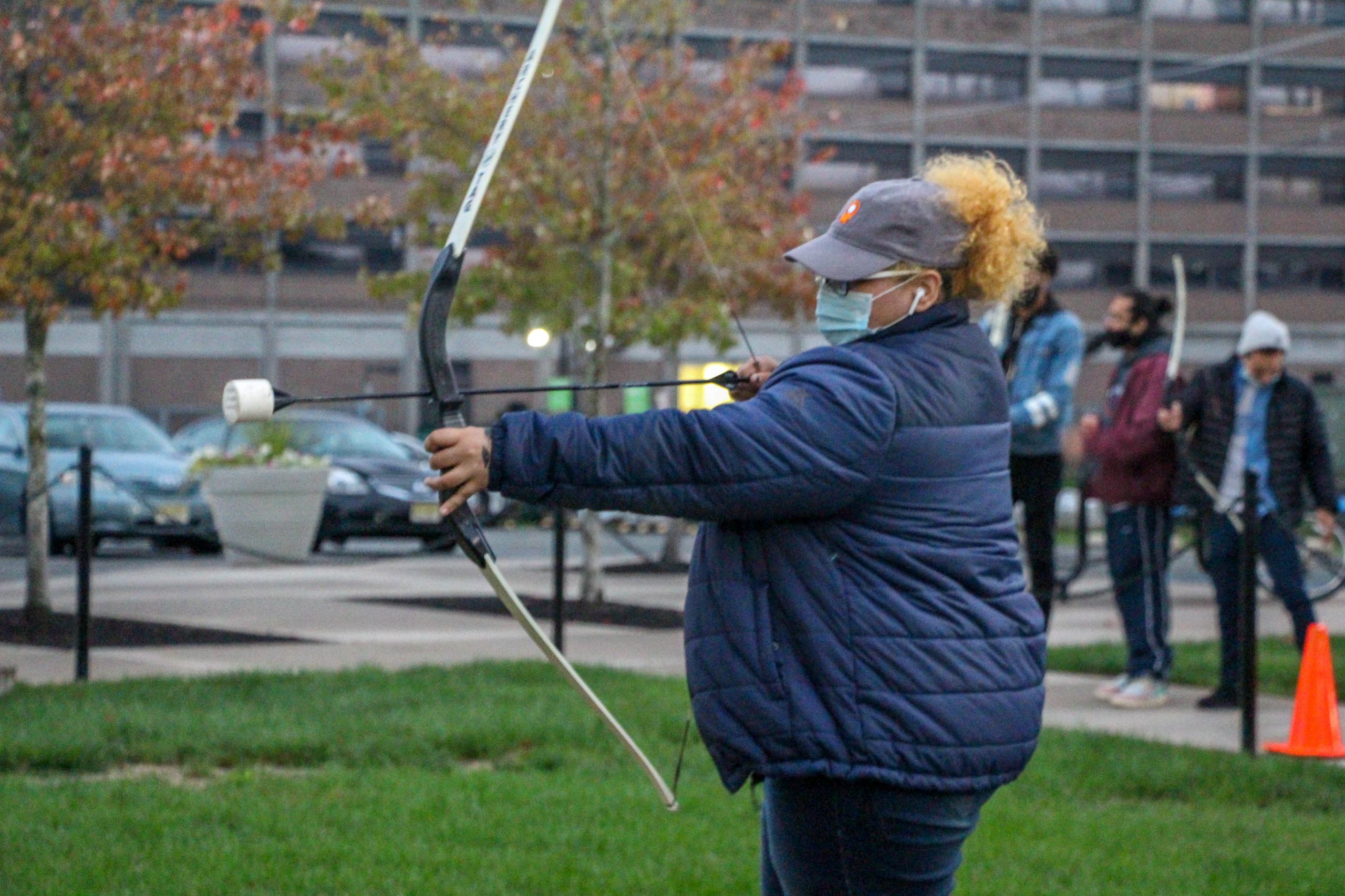 Woman Aiming a Bow and Arrow