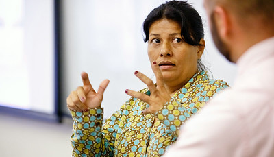 Woman talking to man