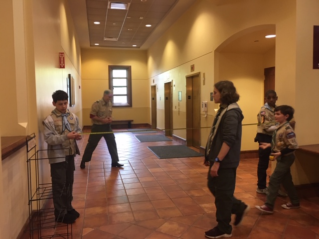 scouts measuring hallway