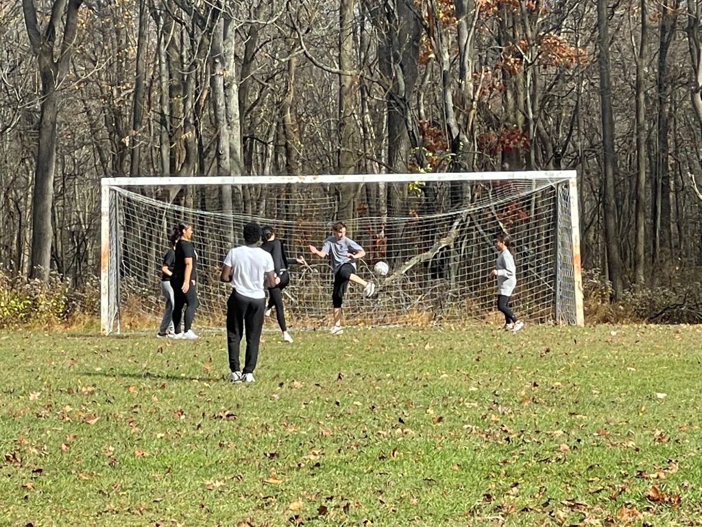 NextGen students play soccer