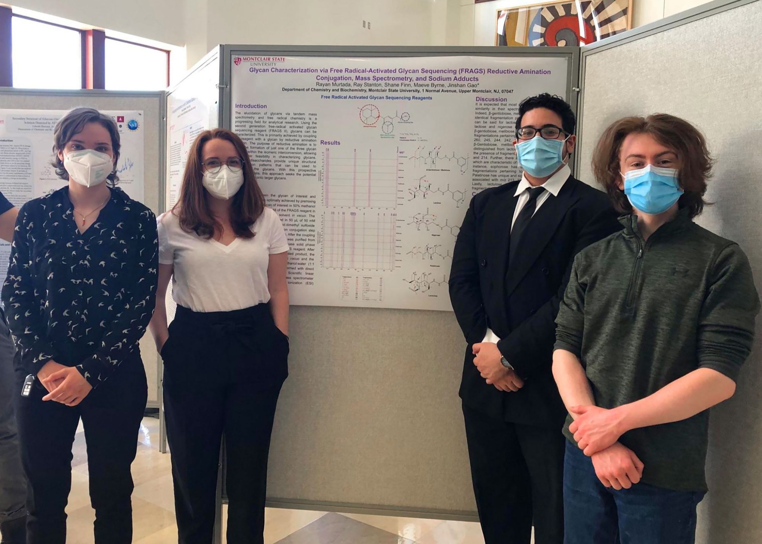 lab group with poster