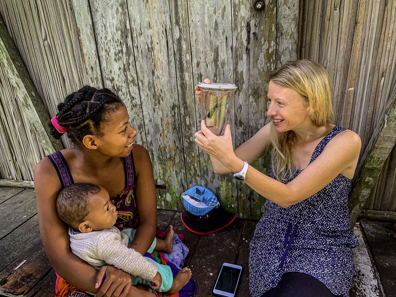 Professor Borgerson shows villagers a sakondry in Madagascar