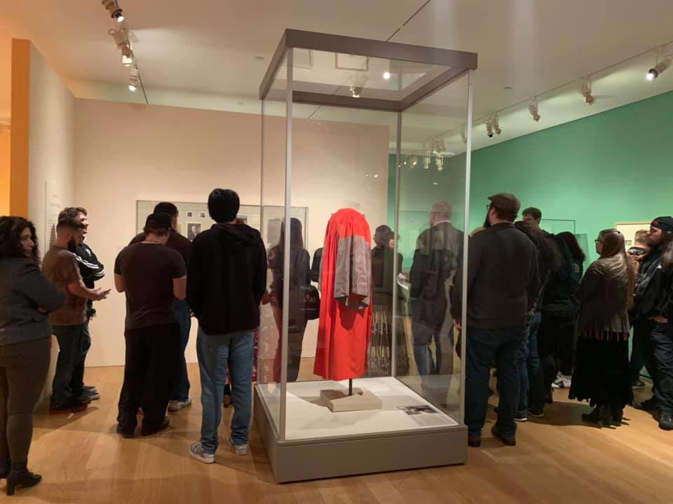 Photo of students and alumni in museum