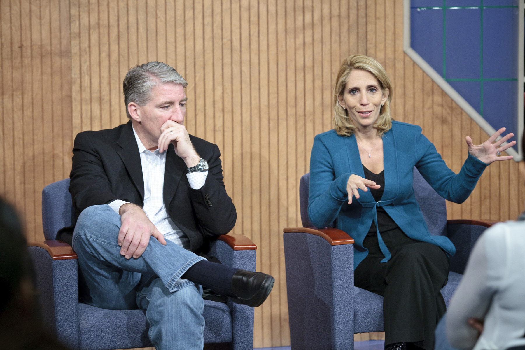 Dana Bash answers a question as John King listens.