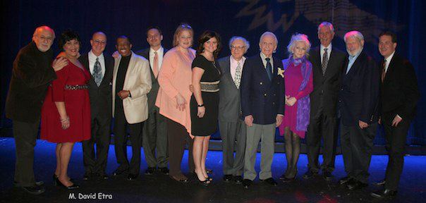 From left to right: Peter Yarrow, Martha Wash, Paul Shaffer, Ben E. King, NMC Director David Sanders, Cracker Barrel's Julie Davis and Julie Craig, Sheldon Harnick, Ervin Drake, Judy Collins, Sonny Fox, Theodore Bikel, and Charles Sanders at the 2012 American Eagle Awards.