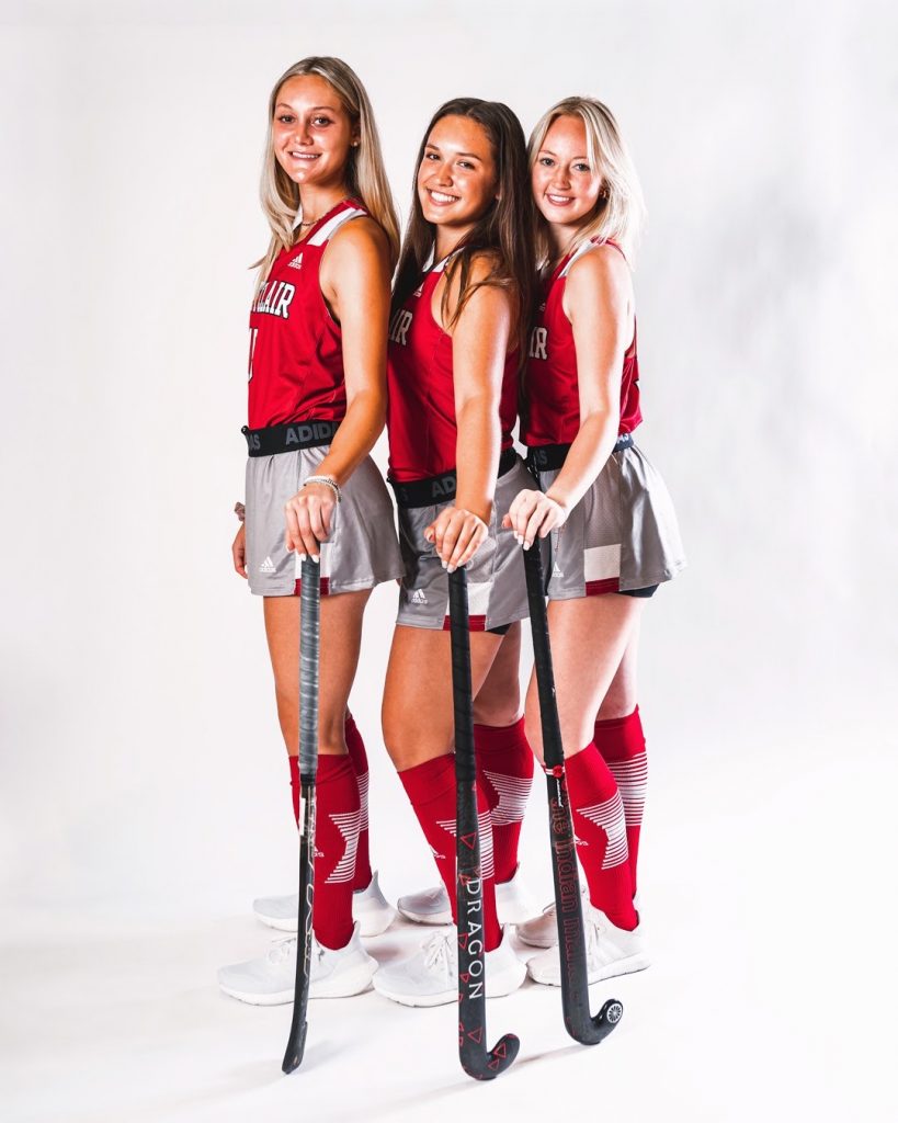 Group shot of recent alum as a college hockey player