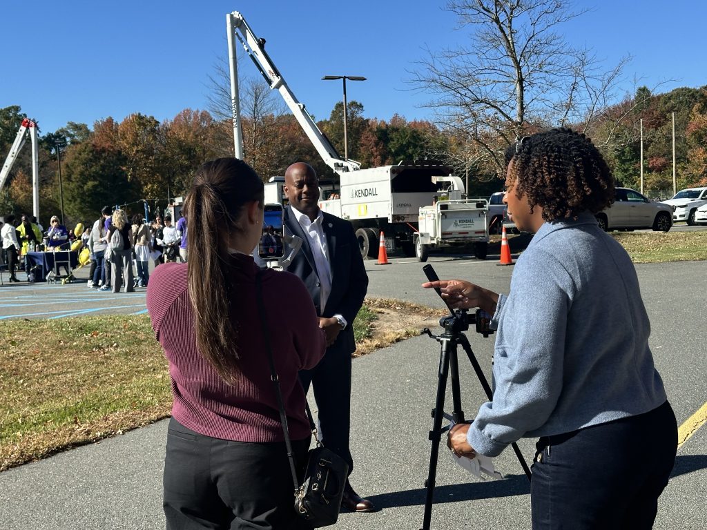 Recent alum in the field interviewing