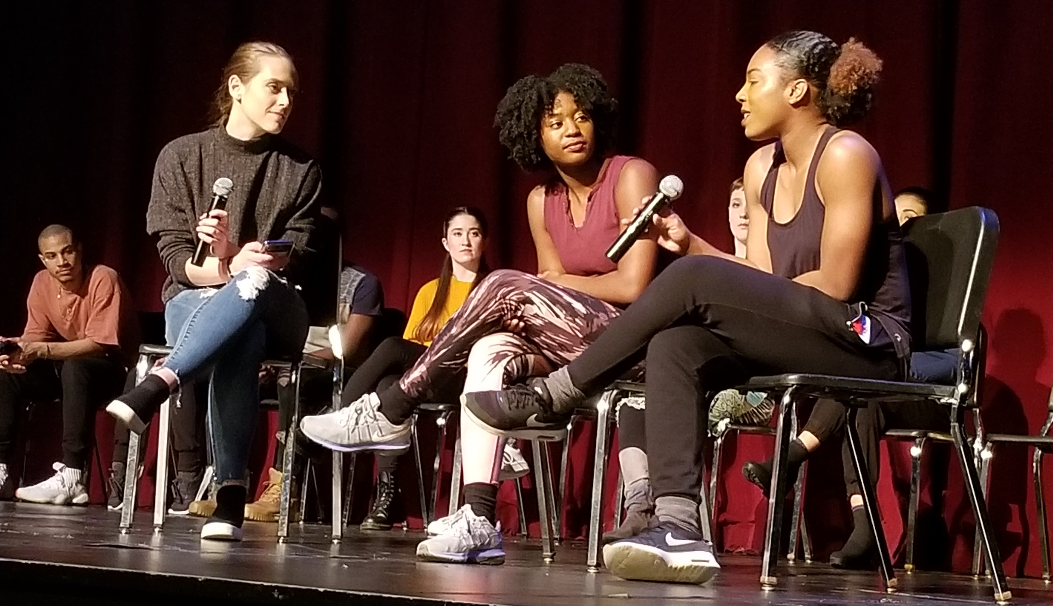 Student choreographers discussing Dance Collage
