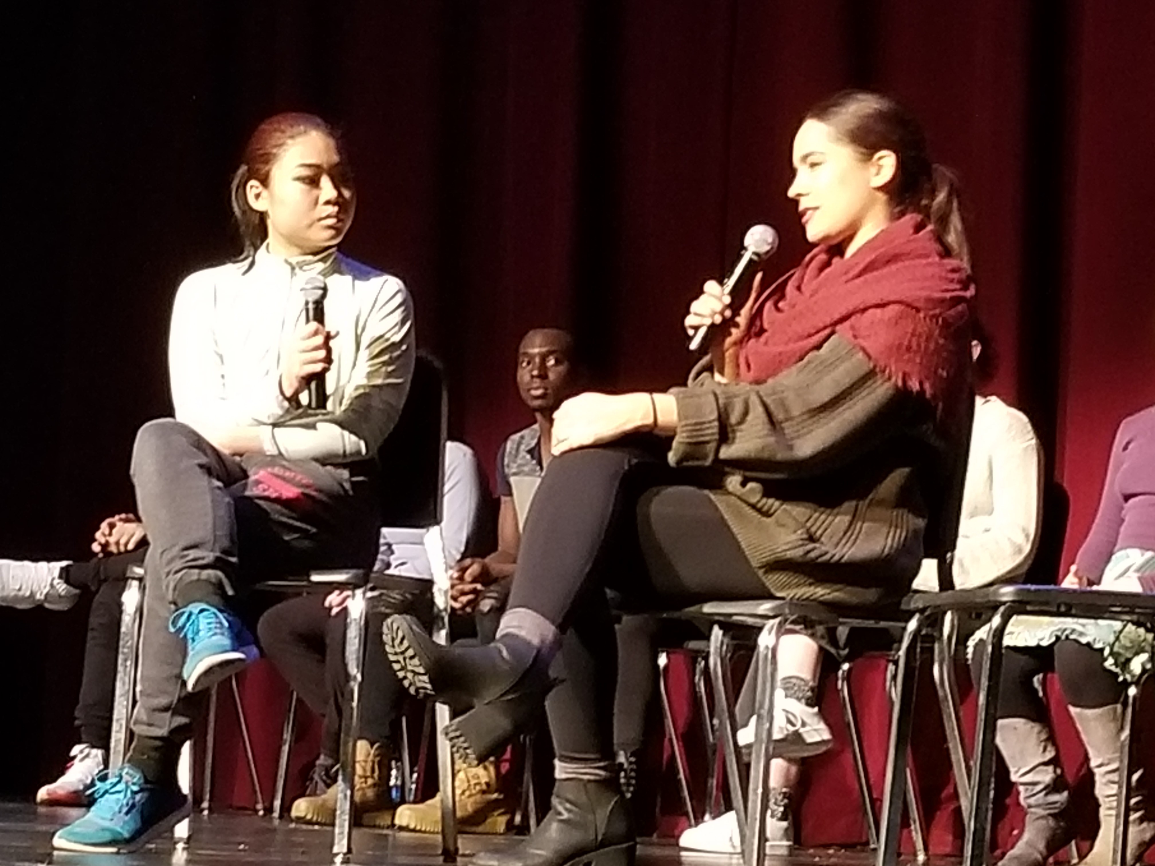 Student choreographers discussing Dance Collage