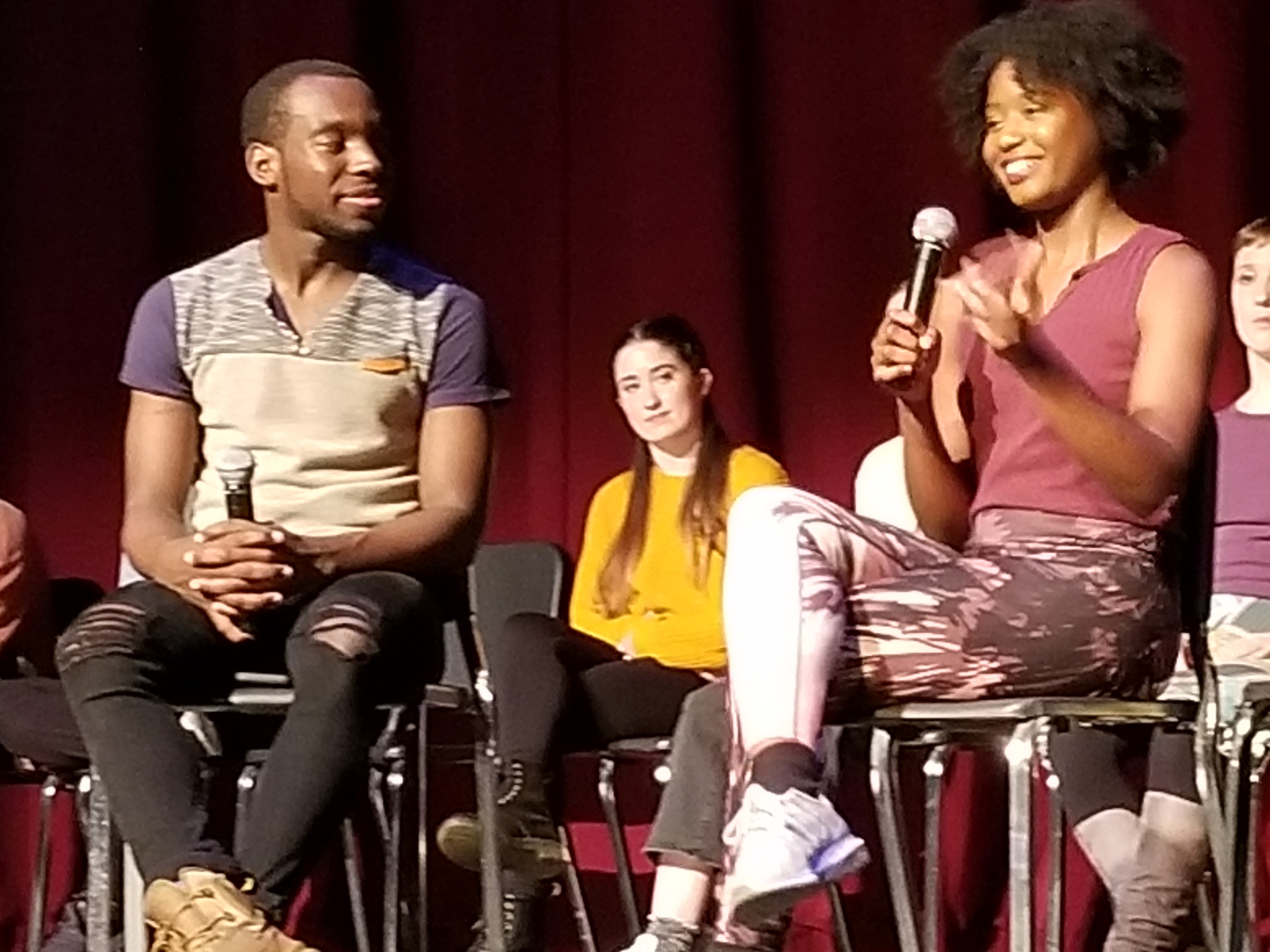Student choreographers discussing Dance Collage