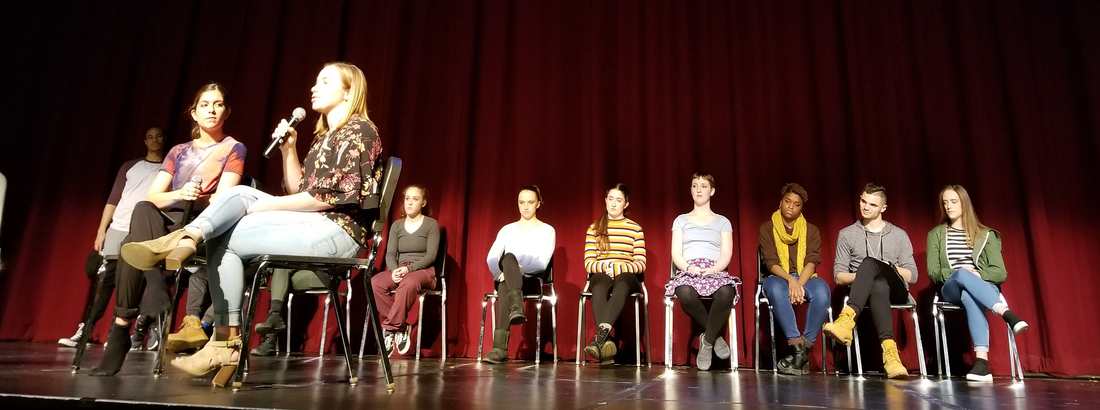 Student choreographers discussing Dance Collage