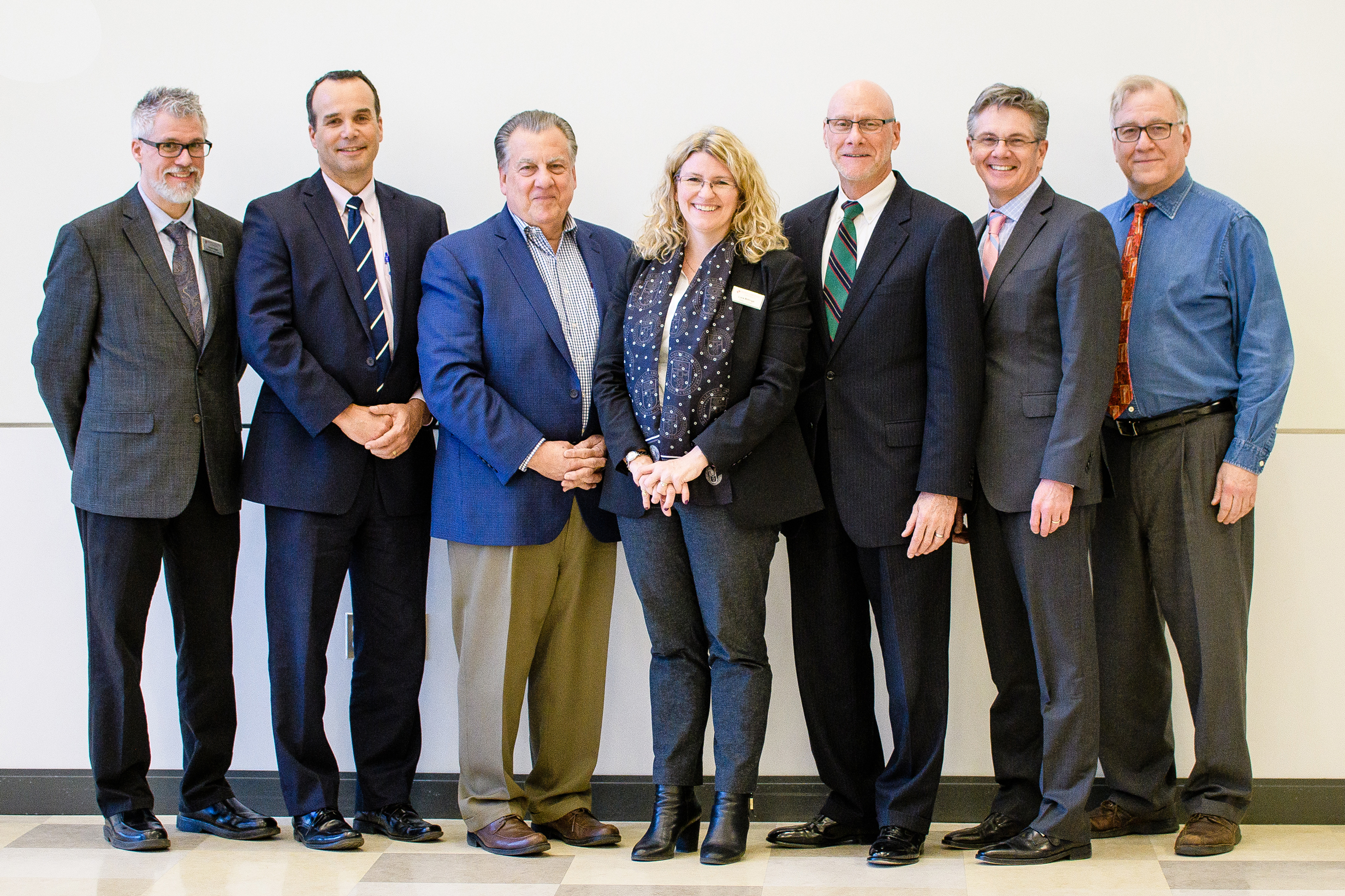 From left: Scott Kight, Tom Lewis, Mario M. Casabona, Lora Billings, Lou Monari, George Kress, Richard Russo
