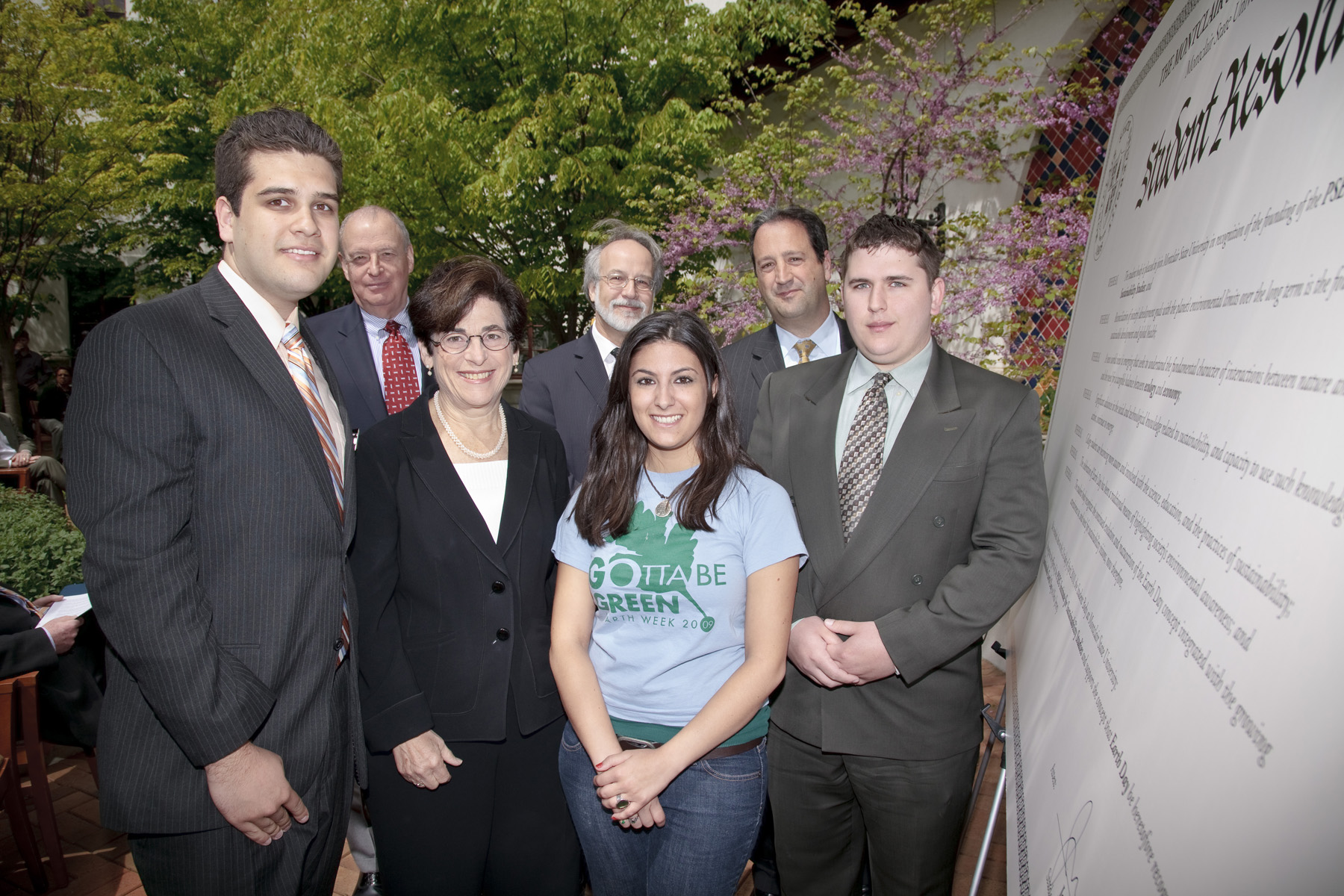 Jonathan Preciado, Michael Weinstein, Susan Cole, Robert Prezant, Leah Thiel, Ralph LaRossa, and Ian Honauer pose with the student resolution.