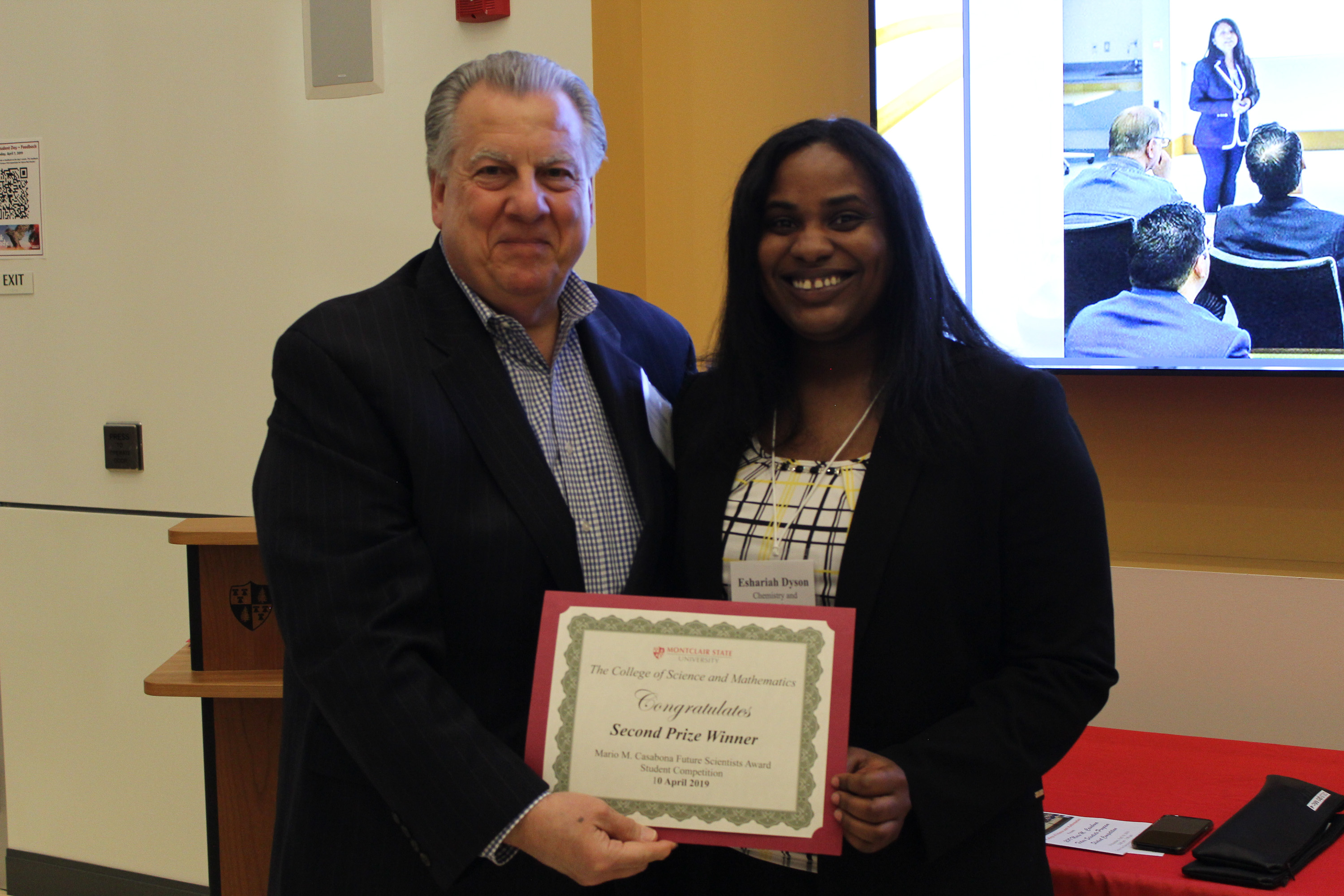 Eshariah Dyson receiving second place award