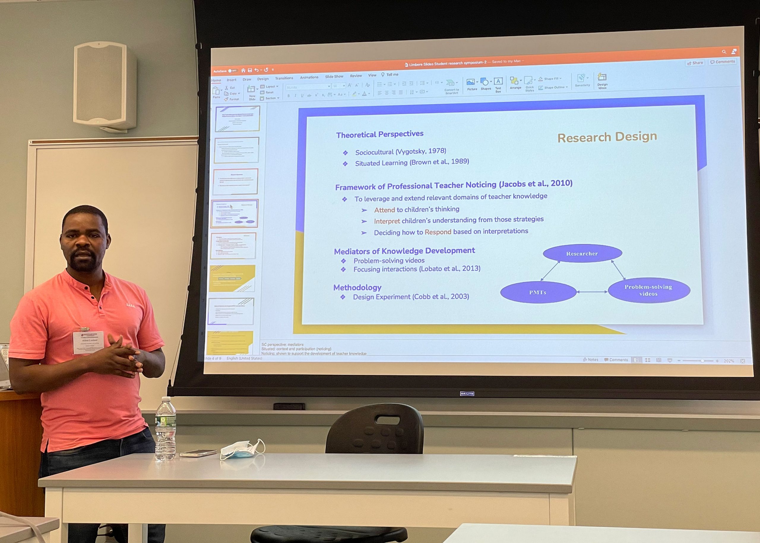 student presents dissertation research