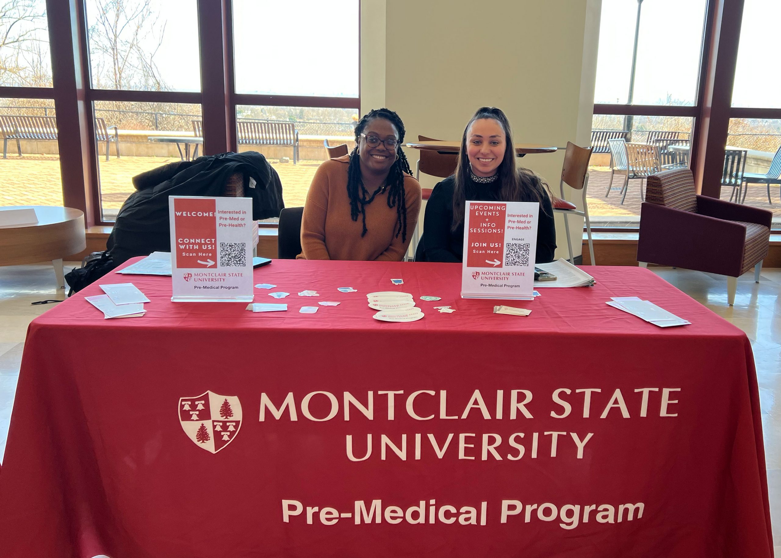 Pre-Med Program table at STEM-Powerment org fair
