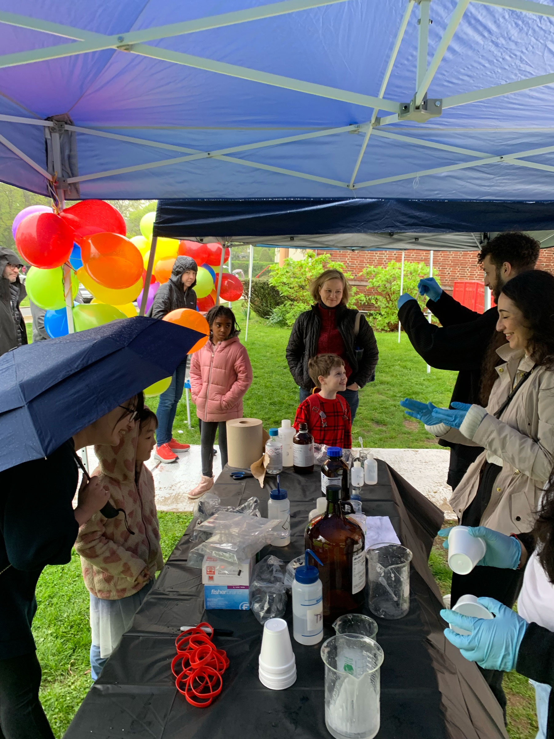 elementary school students at Chem table