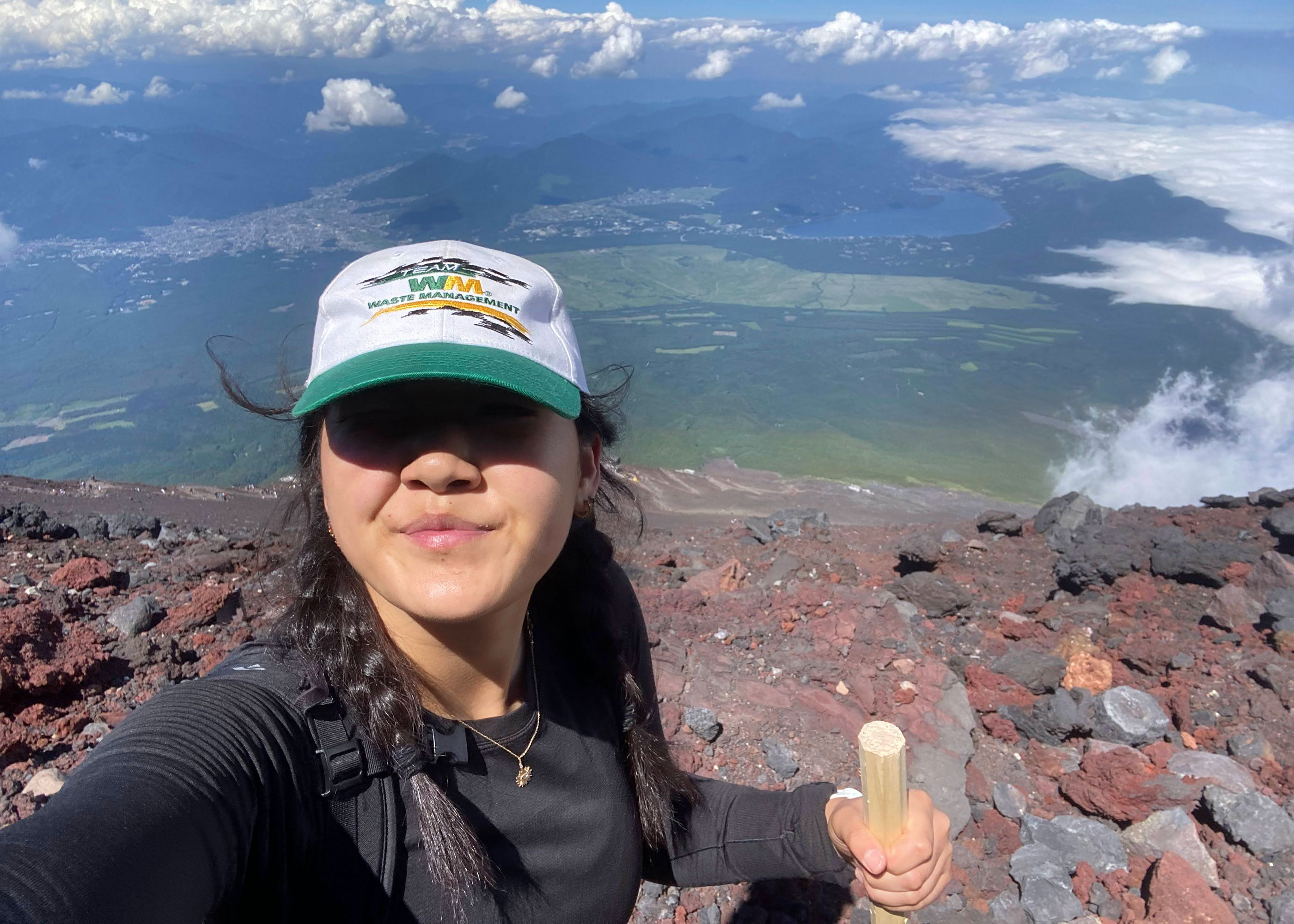Emily selfie from mountaintop