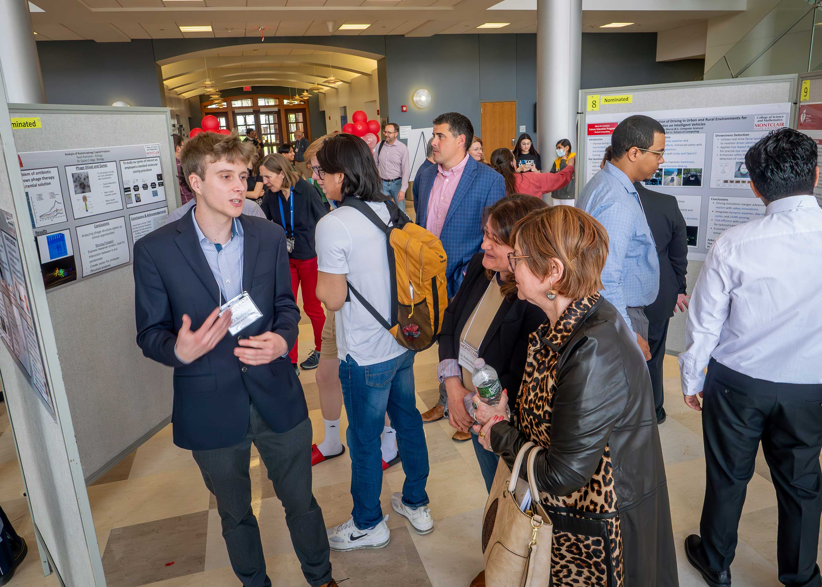 CJ Szafranski during poster session at the Spring 2024 Casabona Competition