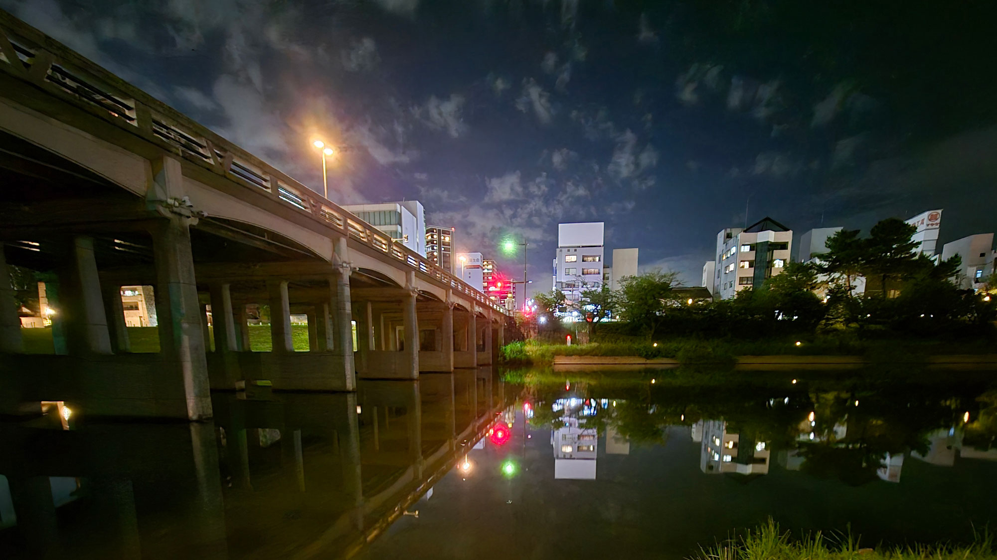 bridge over river at night