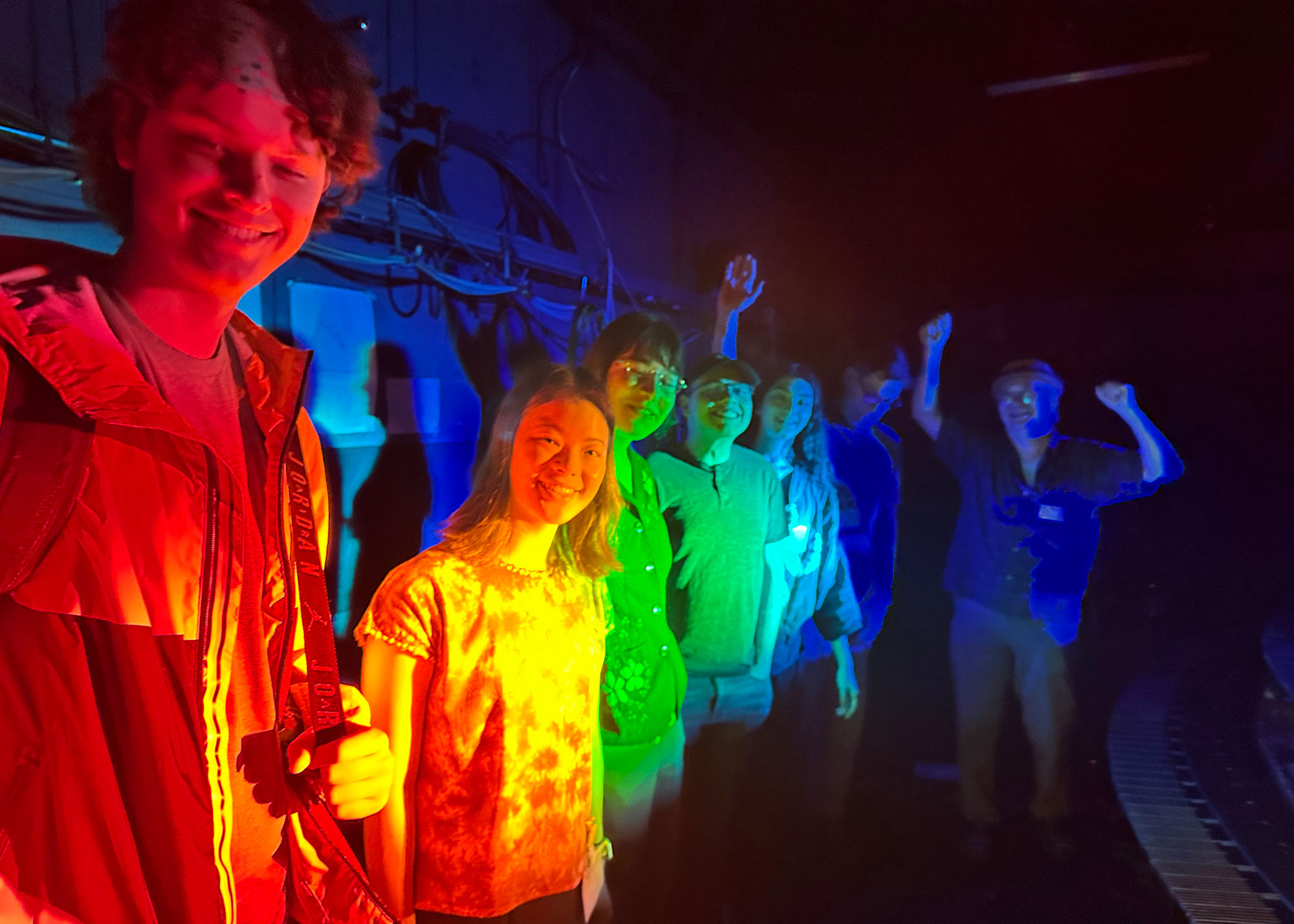 group photo in rainbow exhibit