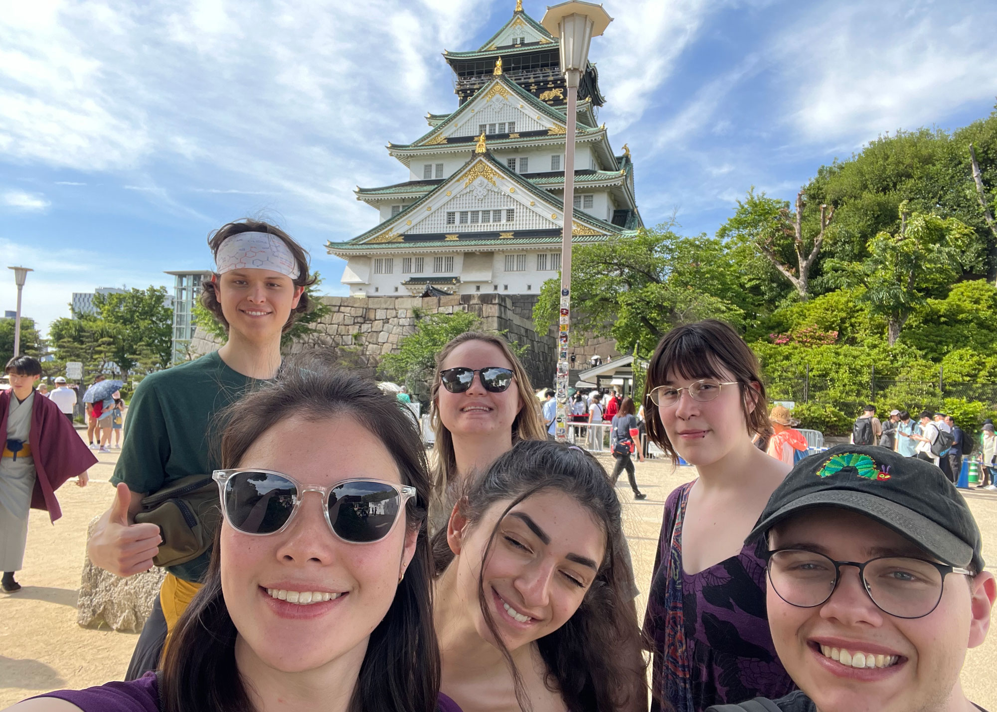 selfie in front of ornate Japanese building