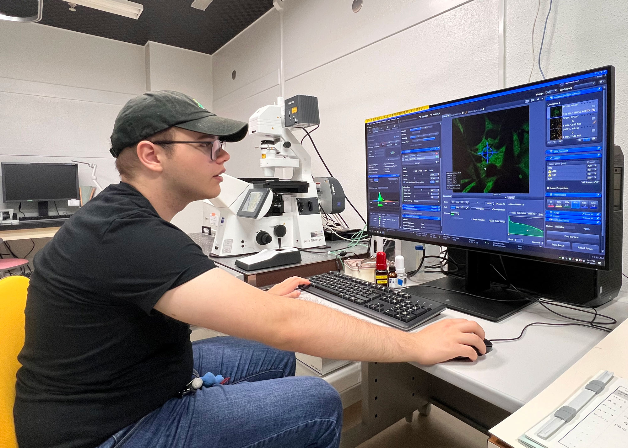student working on computer in lab