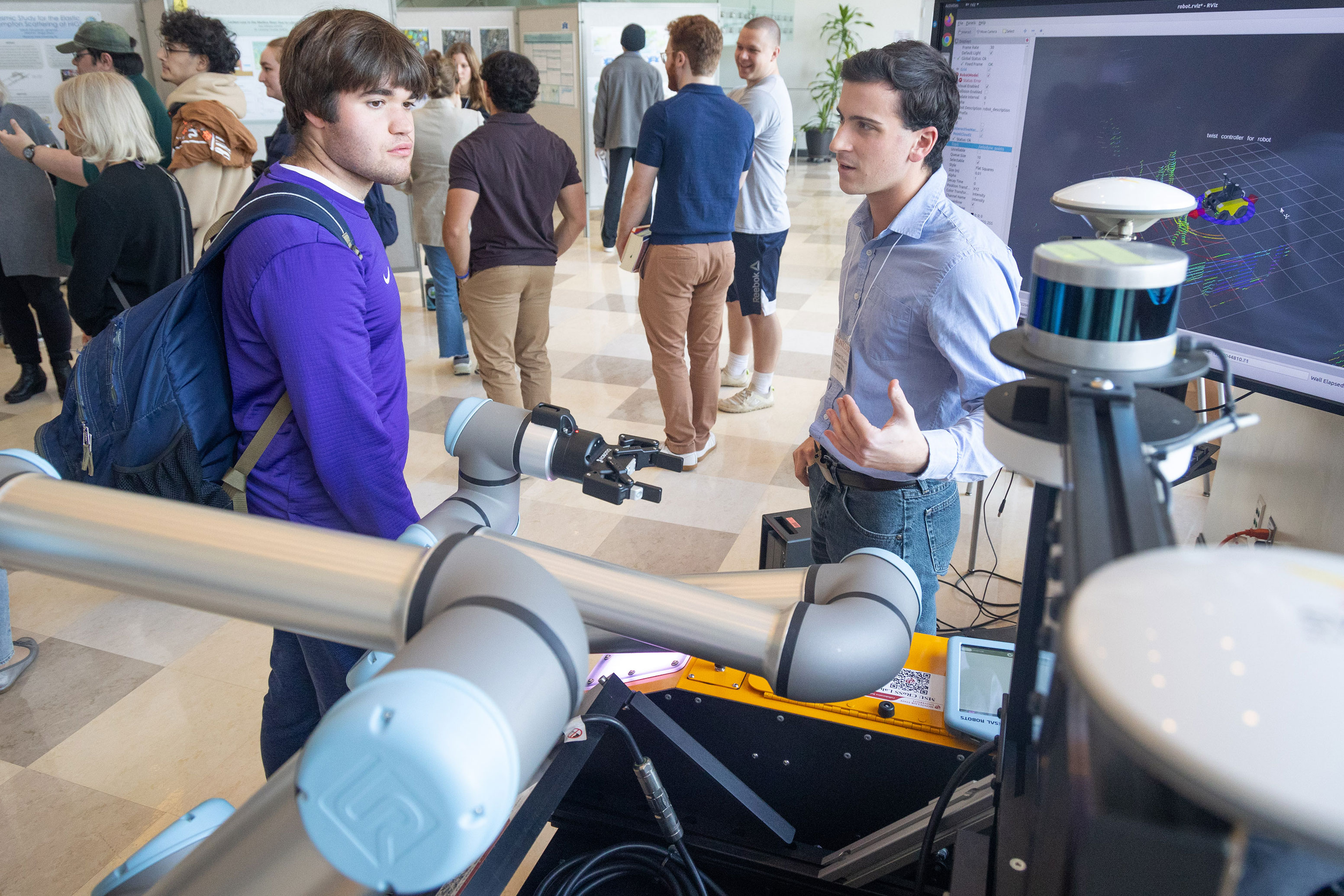 Garrett Modery showing their robot at the Fall 2024 Casabona Competition