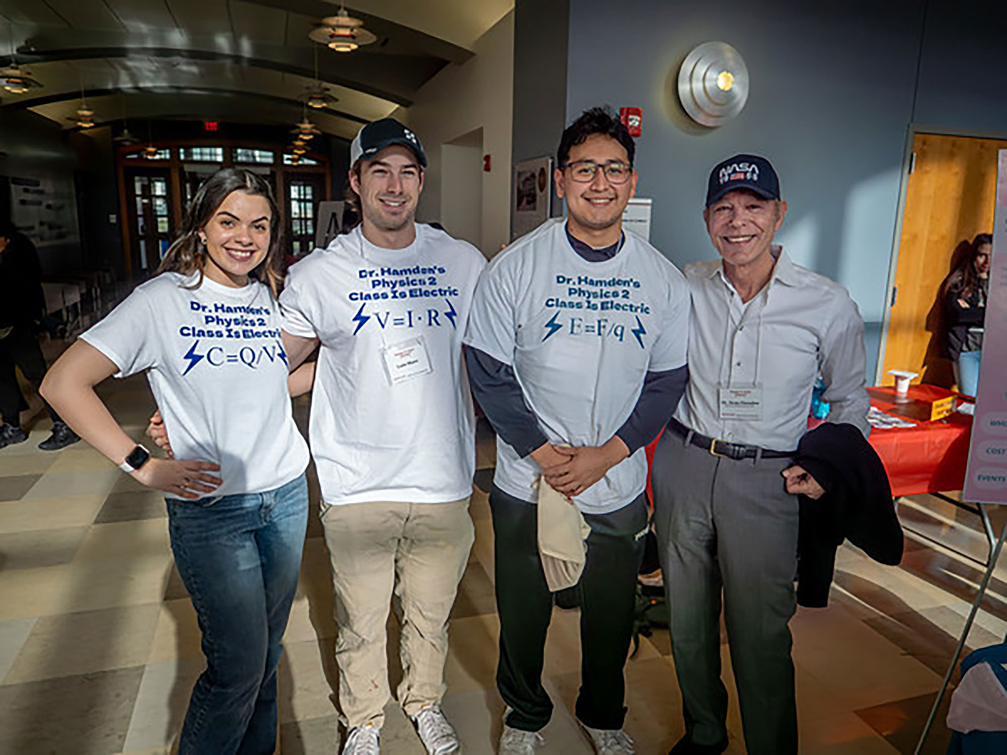 professor and students attending the Women in STEM summit