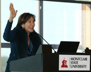 Mimi Feliciano speaking at podium