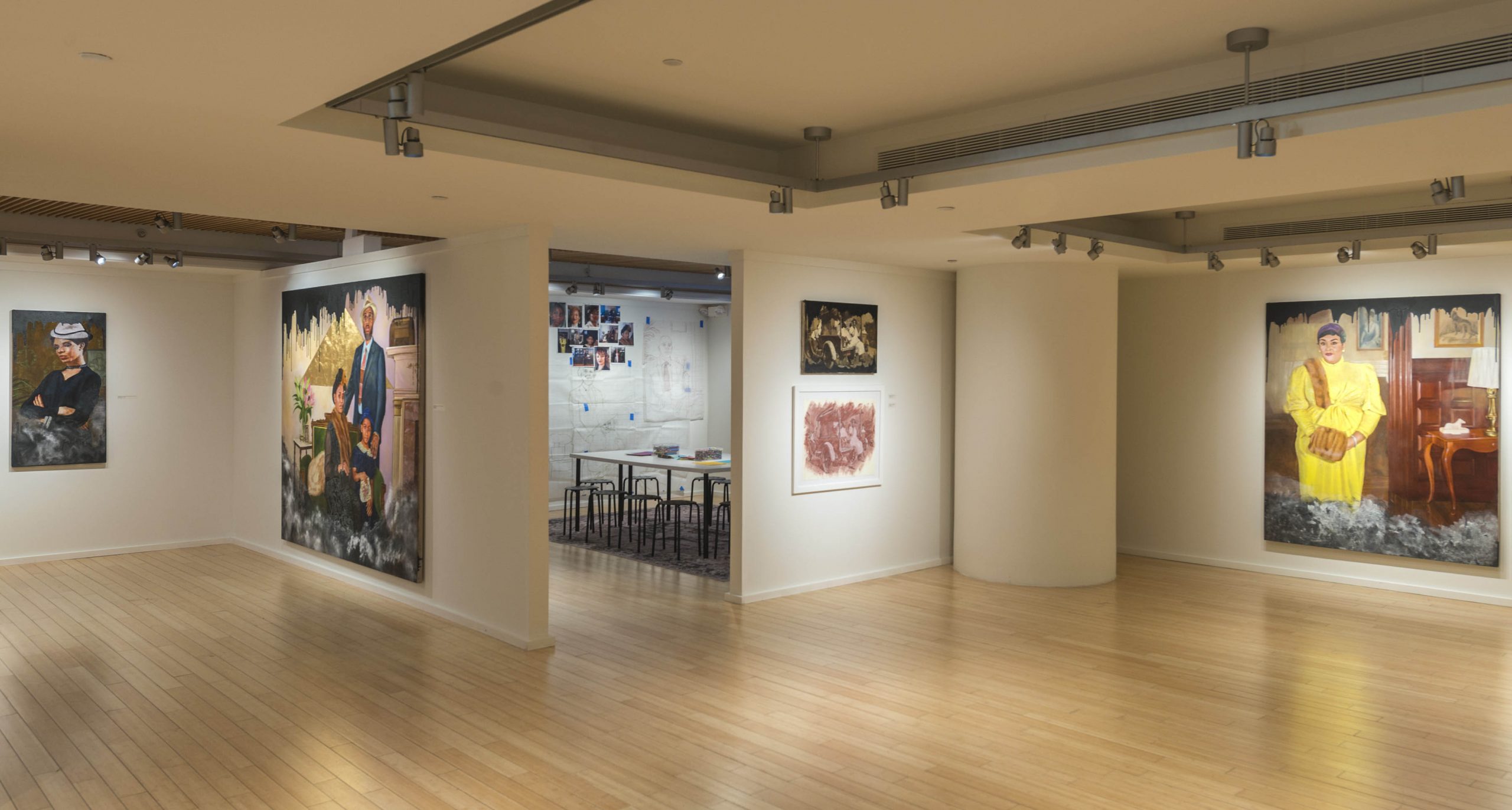 Installation photography in the George Segal Gallery of paintings on view in the University Galleries' spring 2022 exhibition, Ajamu Kojo's "Black Wall Street: A Case for Reparations"