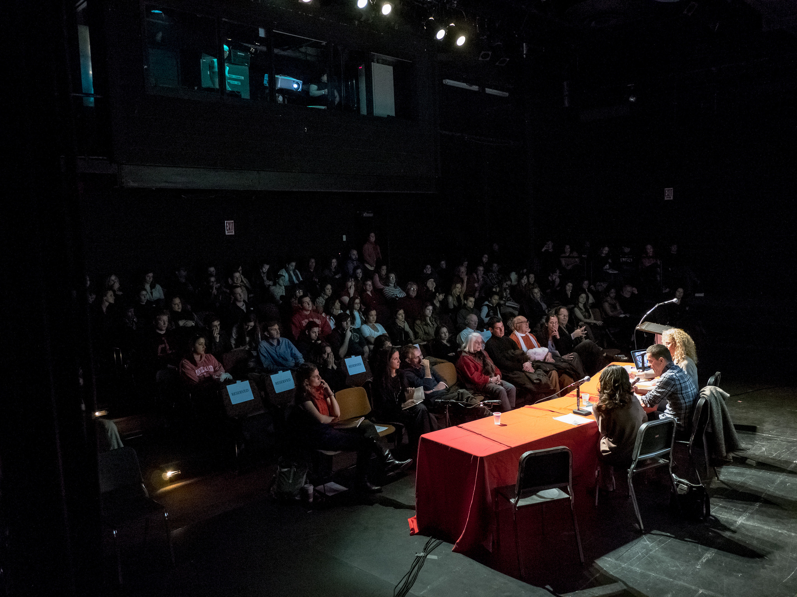wide view of panelists and audience