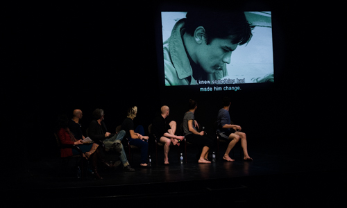 Panelists screening a film