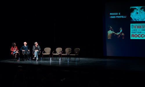 panelists screening a video