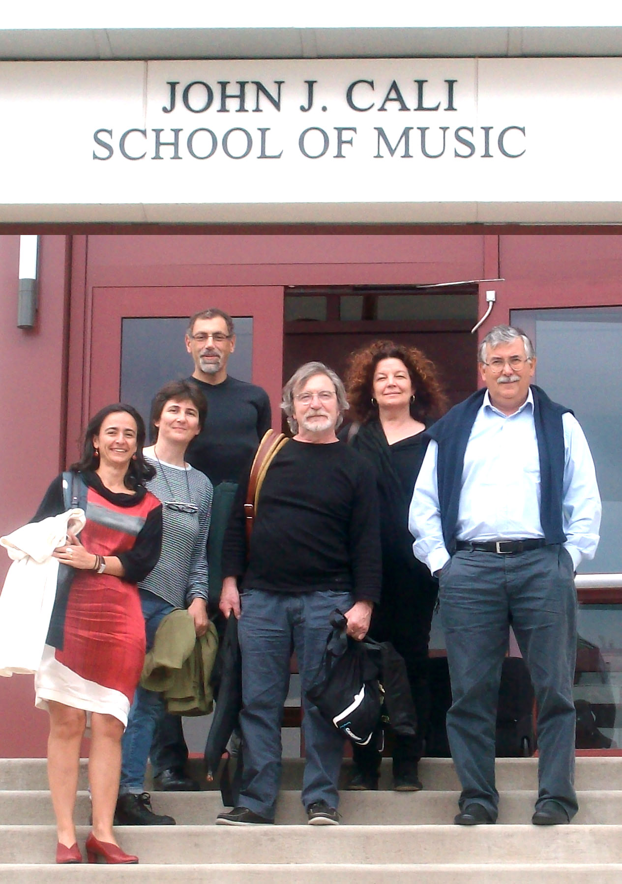 Group in front of Cali School of Music sign