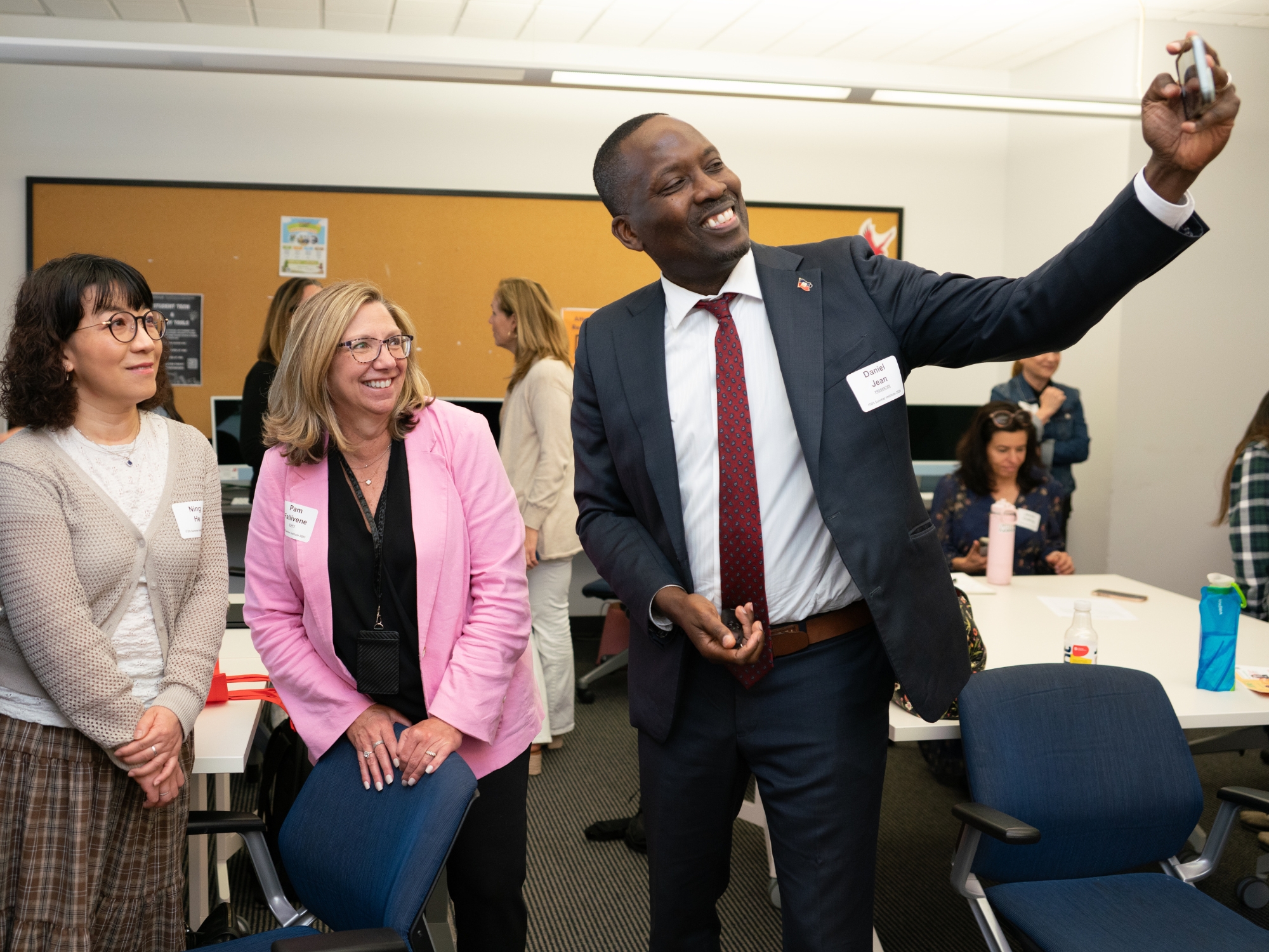 Three people posing for a selfie.