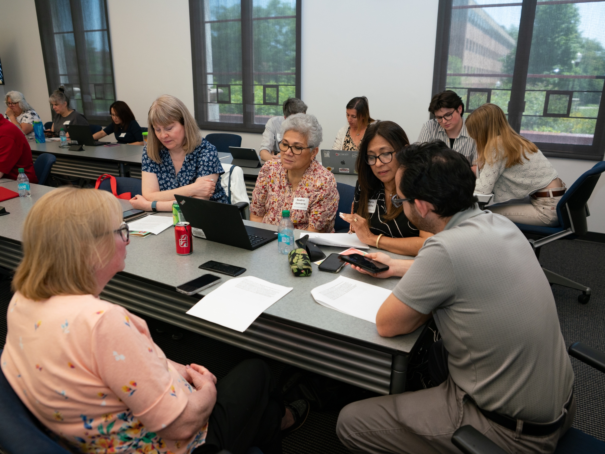 Groups of people participating in a group discussion.
