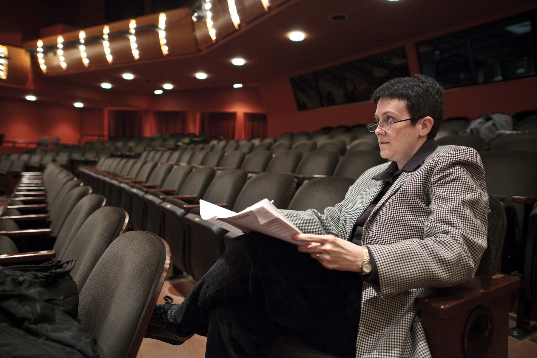 The composer takes mental notes as the orchestra plays.