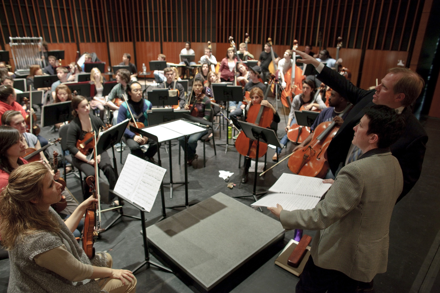 Hostetter gives some instructions to the orchestra.