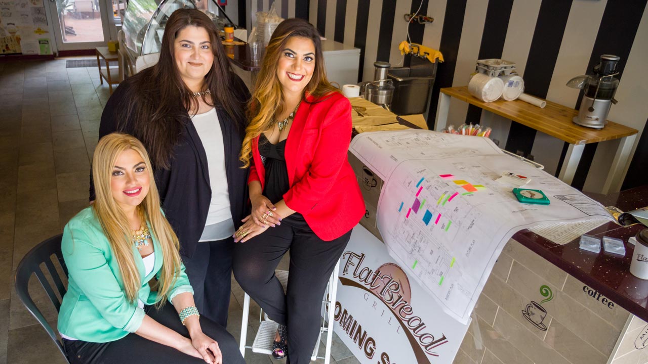 Photo of the Esendemir sisters in their restaurant during its construction phase.