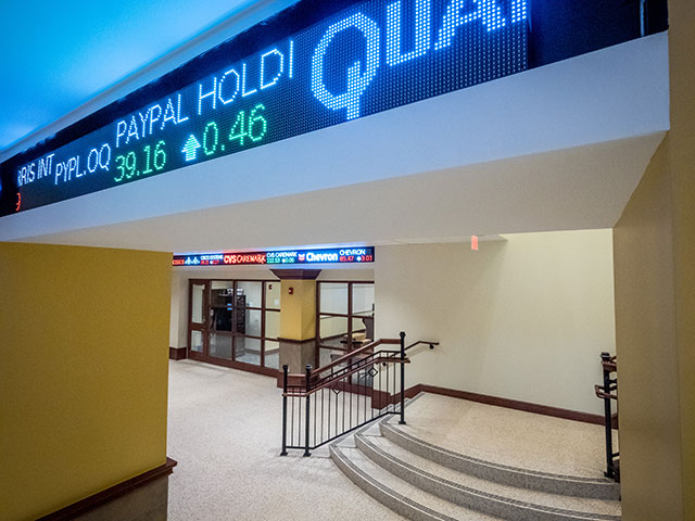 Stock market ticker in the Feliciano School of Business.