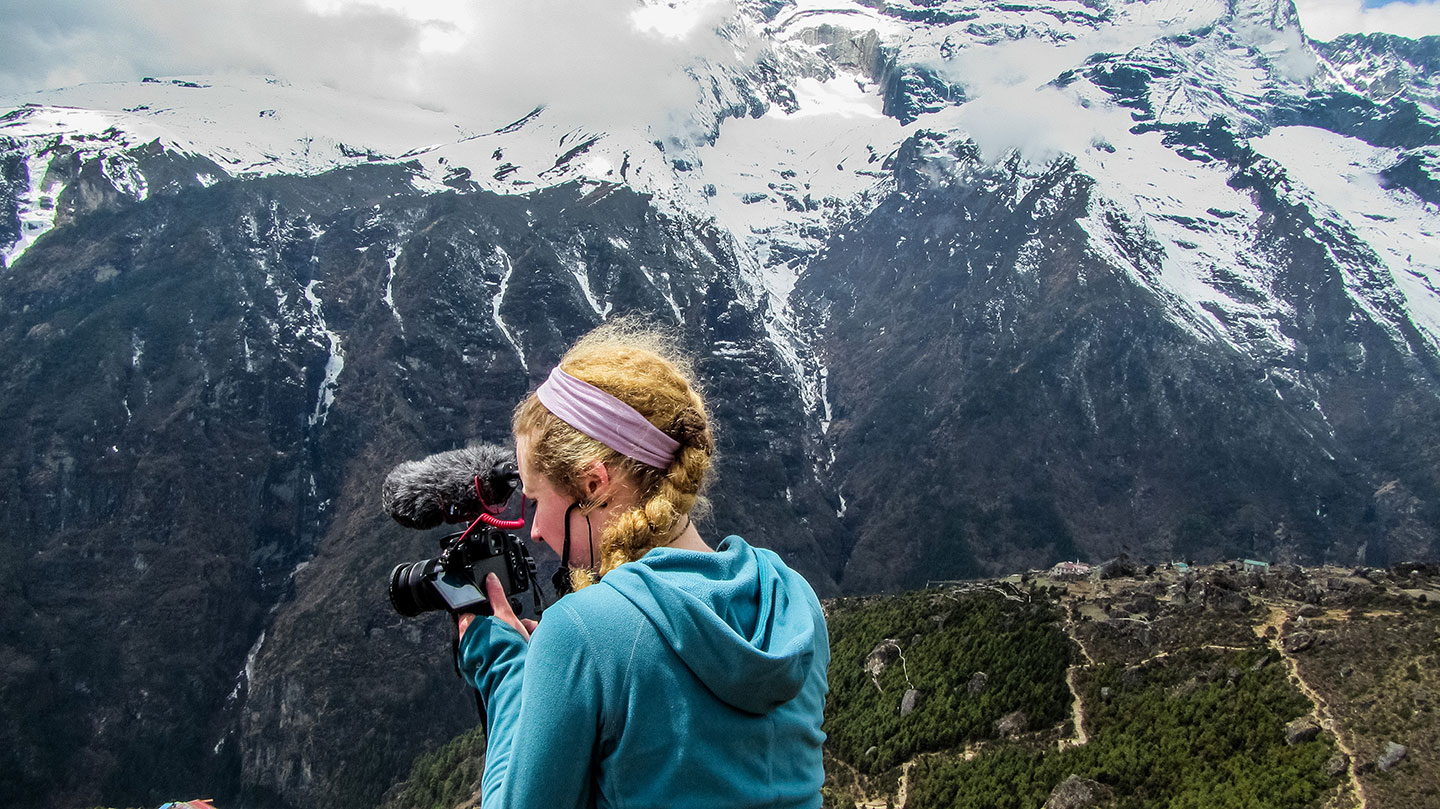 Sierra Johansen ’14 shoots footage in Namche on the way to Mount Everest.  