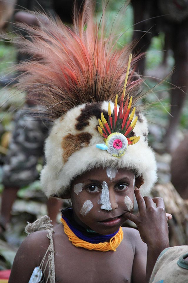 A young Hewa in ceremonial dress.
