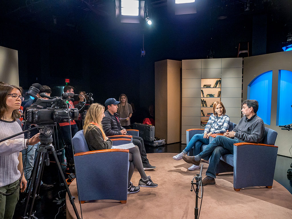 Cuban Filmmakers Diana Rosa Pérez Legón and Jorge Luis Santana Pérez were interviewed by students Nathalie Tilley and Christian Guaman (seated), and camera operator Kristie Keleshian and other students at the studios at Montclair State.