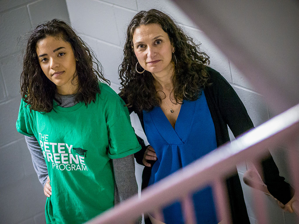 Justice Studies Professor Jessica Henry with student volunteer Gabriela Suriel.