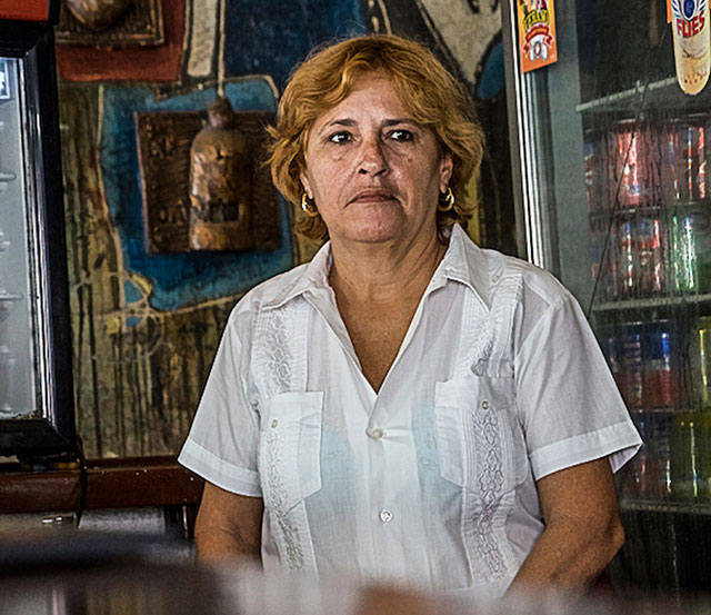 A woman in a store in Cuba.