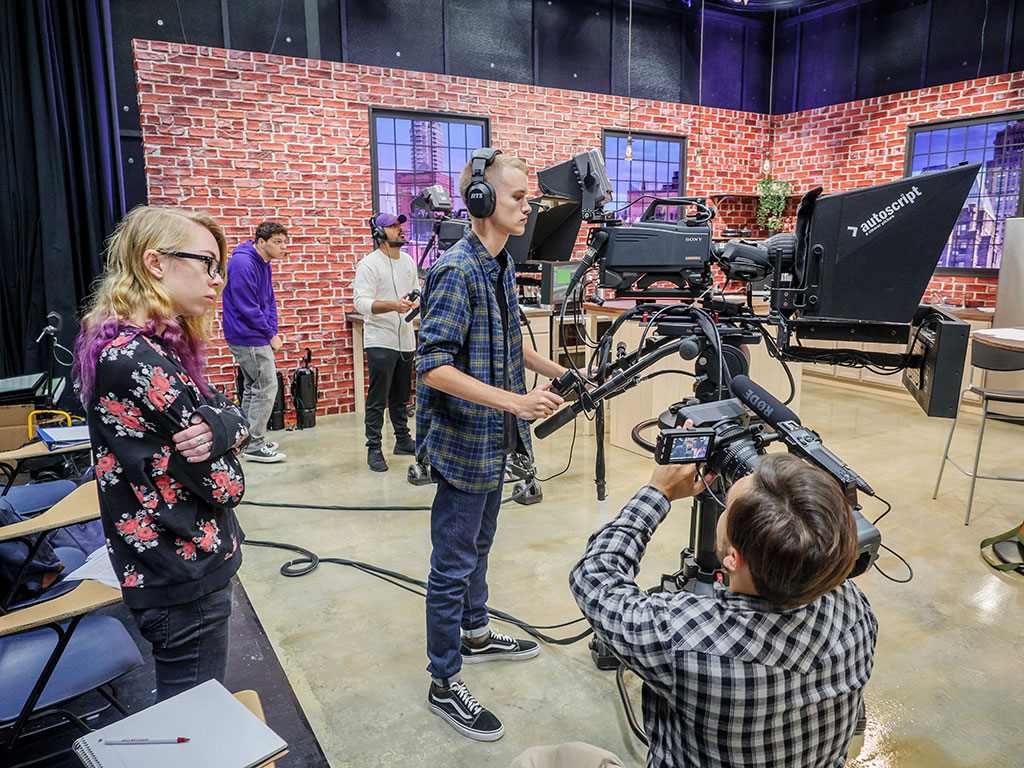 Students tape Carpe Diem.