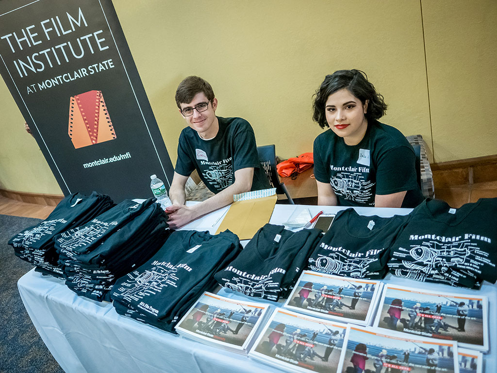 A couple of members from the Film Institute sitting at table.