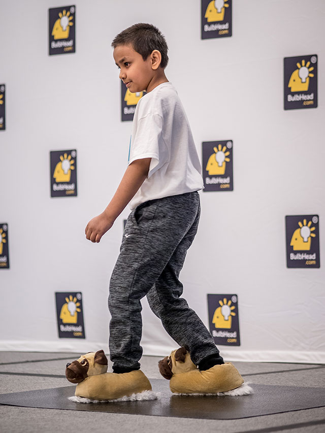 Neatsweeps rolls out the cute factor with Tanim, 8, demonstrating the house-cleaning slippers during the pitch.